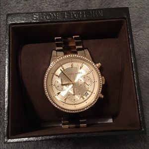 Gold and tortoise watch with rinestones